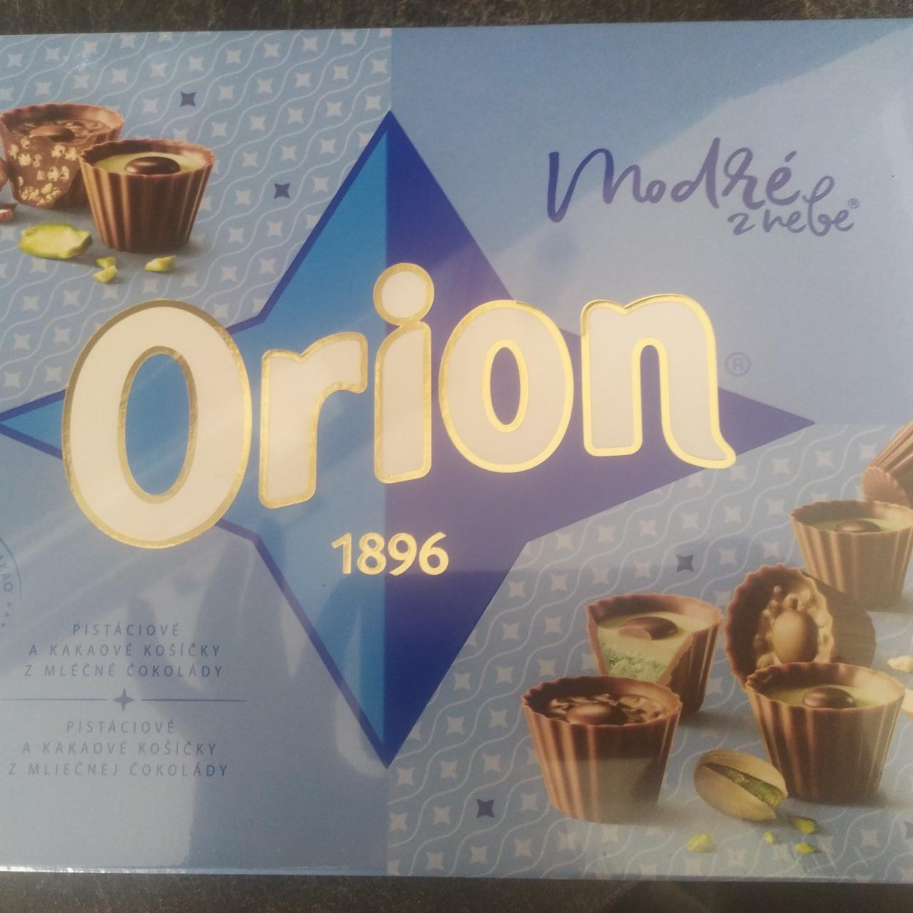 Fotografie - Modré z nebe pistáciové a kakaové košíčky z mléčné čokolády Orion