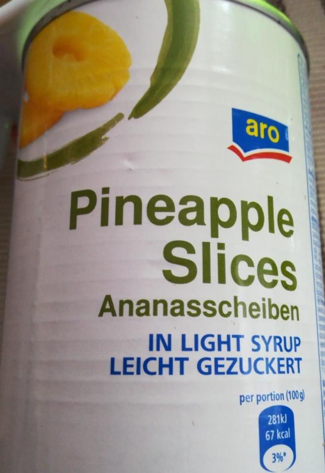 Fotografie - Pineapple slices in light sirup Aro