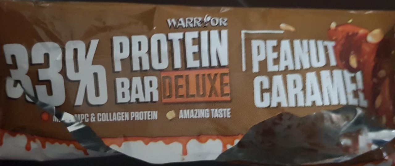 Fotografie - 33% Protein Bar Deluxe Peanut Caramel Warrior