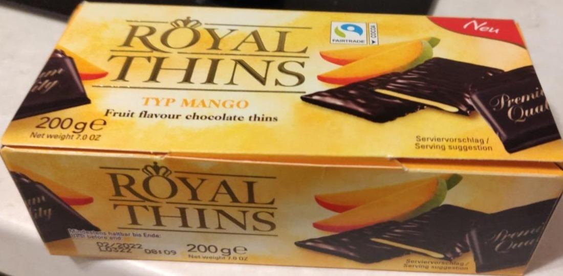 Fotografie - dark chocolate filled with 49% mango flavour filling Royal thins